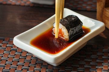 Sushi maki rolls (tuna, salmon, shrimp, avocado and other ingredients). japanese food. Top view, assorted sushi, all you can eat menu. copy space