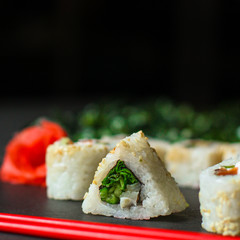 Sushi maki rolls (tuna, salmon, shrimp, avocado and other ingredients). japanese food. Top view, assorted sushi, all you can eat menu. copy space