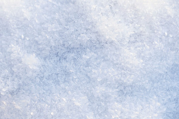 the first snow, the texture of the snow, snow abstract background with blue tint