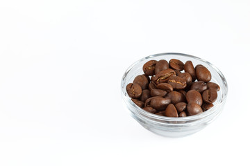 Coffee beans. Coffee beans in a bowl on a white background.