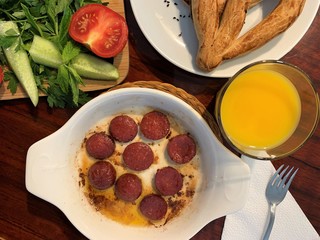 Turkish breakfast with sujuk and orange juice. Sujuk is a dry, spicy sausage which is eaten from the Balkans to the Middle East and Central Asia. 