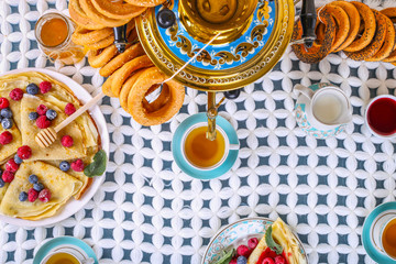 tea drinking with a samovar. Maslenitsa. russian pancake week. Top view. Flat lay