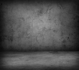 Grey concrete floor and empty gray stone wall background 
