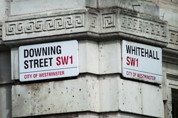 Downing Street sign in a corner of London, England