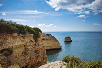 Fototapeta na wymiar Top view on cliffs around Marinha beach in Albufeira, Portugal