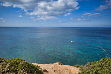 Fototapeta na wymiar Sea view from a cliff of Marinha beach in Albufeira, Portugal