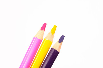 set of colored pencils on a white background