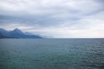 Sea and mountains in Turkey in cloudy weather