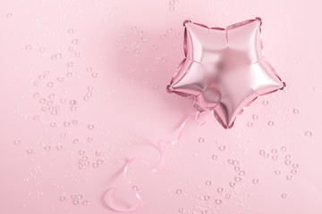 Festive pink background. Shining stars and shining balloons on light pink pastel background....