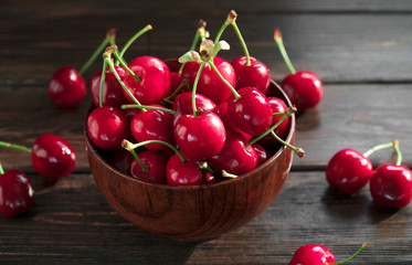 Sweet Red Cherries In A Plate On A Wooden Background