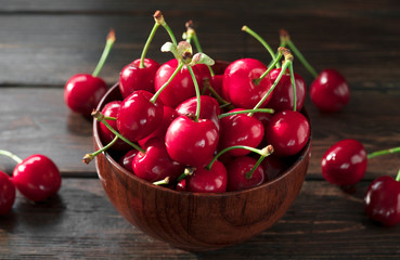 Sweet Red Cherries In A Plate On A Wooden Background