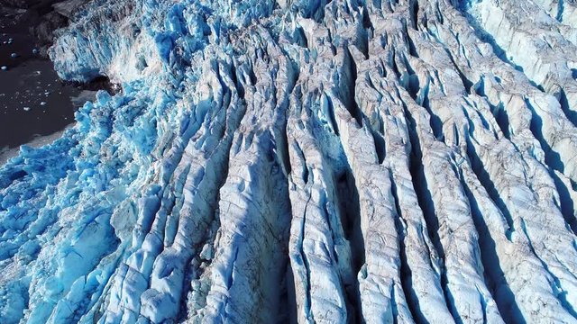 Aerial of glacier ice sheets in Alaska. Aialik millennia