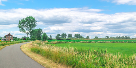 Fototapeta na wymiar Panoramic view of Dutch Country Road