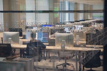 Modern computer class through the window. Education