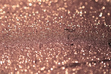 painted silver sand made of glitters - shining concept with bokeh texture - fantastic abstract photo background