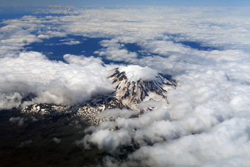 Fototapeta na wymiar Aerial view of Mount Adams, a stratovolcano in Washington State, with Mount Hood, Oregon in the background.