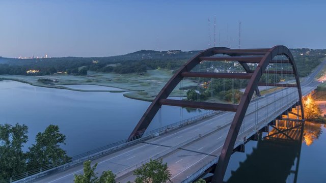 Time Lapse of the Austin 360 Bridge in the Early morning With Downtown Austin in the Background