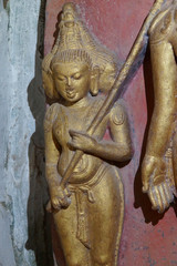 Buddhist statues inset in alcove of the Ananda Phaya Temple