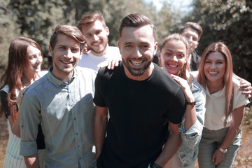 portrait of a group of friends outdoors.