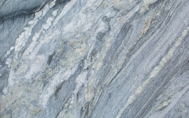 A natural stone. Untreated marble. Texture. Background