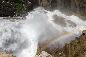 rainbow at the waterfall, rocks