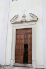 A  large wooden open church door