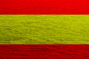 spain state flag superimposed on texture of water, sea, concept of country's water resources