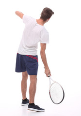 rear view. a young man with a tennis racket.