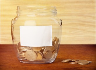 Money Jar with  coins on white background