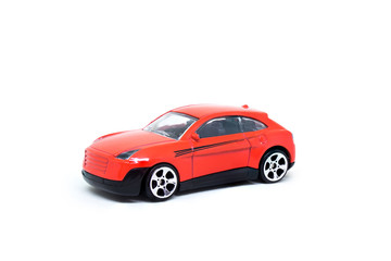 Fototapeta na wymiar Close up red car model toy isolated on white background.