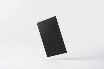 Fototapeta premium front view of black business card on white