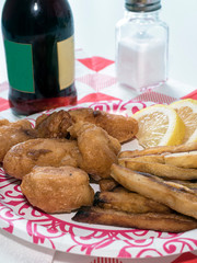 Battered Fish and Chips on Paper Plate Vertical