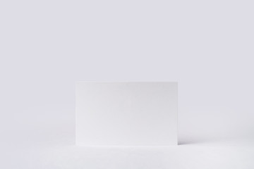 front view of white business card on white