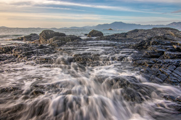 Sea dawn with waves and rocks at nha trang