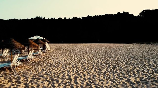 Beautiful and cinematic odeceixe beach umbrellas at vicentina coast, algarve