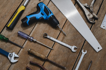 old instruments constructor or renovation for build and repair house on wooden background