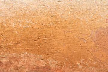 Texture of a concrete wall with cracks and scratches which can be used as a background