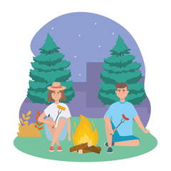 man and woman with wood fire and sausage with cob