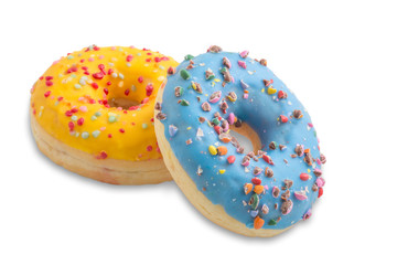 Donuts decorated in colors and chocolate chips. Isolated white background