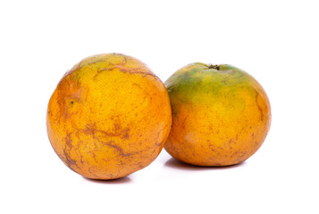 Fresh green tangerine that gives high vitamin C, isolated from the white background
