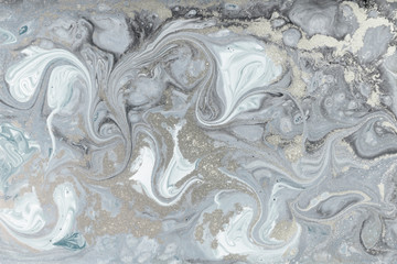 Marbling pattern. Golden powder marble liquid texture.