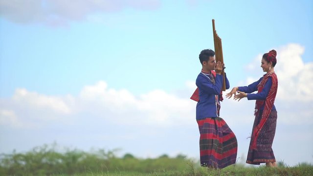 Traditional Thai dressing dancer with nature background