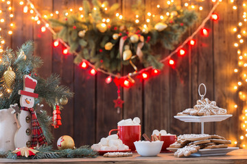 Christmas cookies on wooden table in kitchen