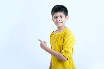 young indian boy showing fingers