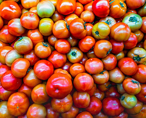 Small Red Cherry Round Tomatoes After Harvest Before Being Taken Into Delivery Proccess. Solanum lycopersicum cerasiforme variety.