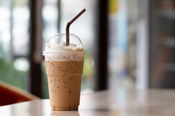Iced coffee with milkshake, Summer refreshment drinks on desk background in cafe