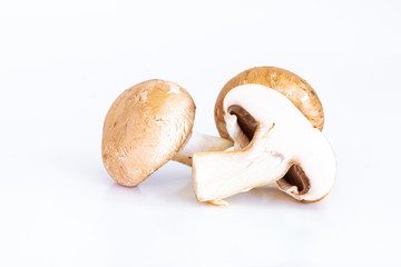 Fresh champignon mushrooms on white background, Isolated food and nature object