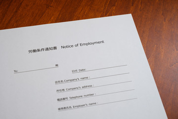 写真素材：外国人向け労働条件通知書　英語　働き方改革　雇用　求人　採用　就職　転職