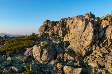 mountain landscape in the rays of the rising sun