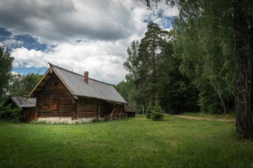 Fototapeta na wymiar Old wooden house in the woods.